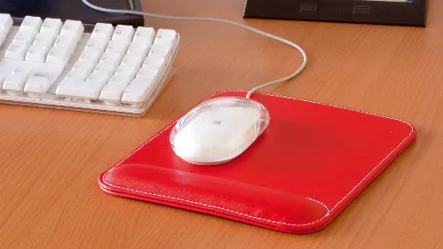 Mousepad with padded wrist rest made from PU with non slip base Gong